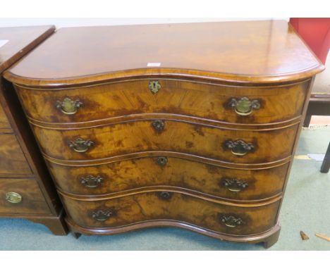 A Georgian walnut chest with four graduating drawers on bracket feet, 84cm high x 98cm wide x 58cm deep Condition Report: Che