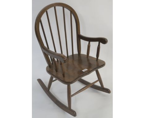 A childs mahogany rocking chair , two boxes of books and two pairs of curtains Condition Report: Available upon request