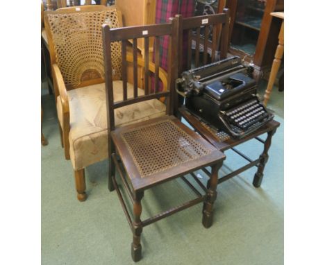 An armchair with cane back, two chairs and an Everest typewriter (4) Condition Report: Available upon request