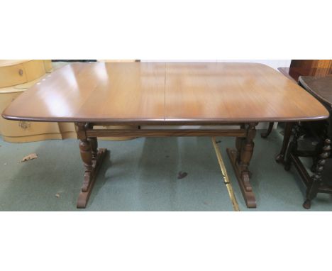 An Ercol Windsor refectory extending dining table with three extra leaves 73cm high x 254cm wide x 102cm deep Condition Repor