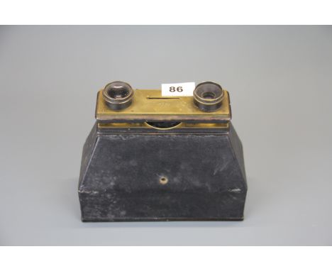 A Jules Carpenter photo Jumelle camera with 15 dark slides, 21cm x 8cm x 19cm.