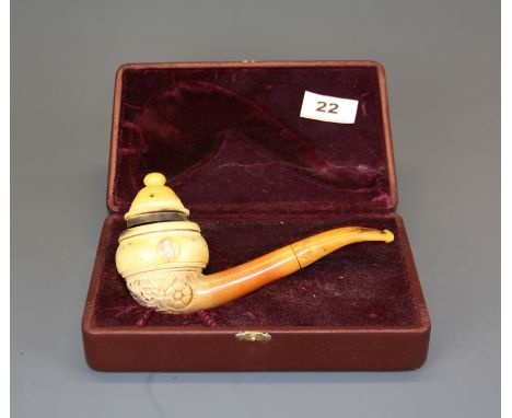 A rare meerschaum carved smoking pipe by 'artist Ismail Ozel' with erotic scenes visible through a revolving outer bowl.