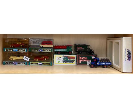 A group of Corgi die cast model vehicles.