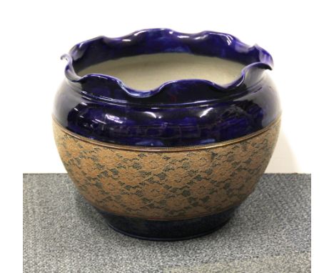 A large Royal Doulton Silicon ware planter, Dia. 46cm. H. 35cm. Some visible cracking to interior.
