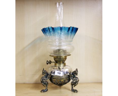 A superb Victorian brass and glass oil lamp with original fluted blue shade, H. 45cm.