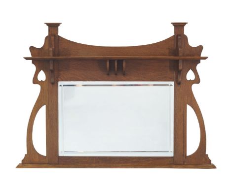 An Arts and crafts oak over-mantle mirror, possibly retailed by Liberty & Co, c.1905, With rectangular bevelled plate, set wi