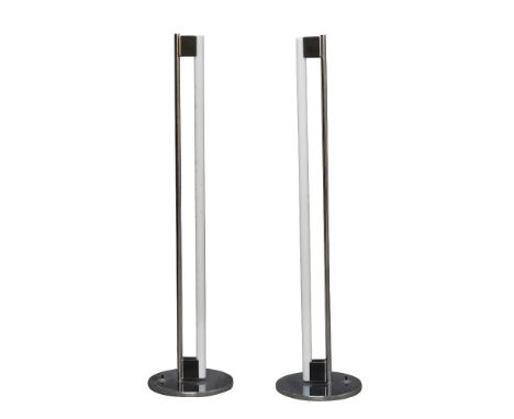 Eileen Gray (British 1878-1976), a pair of chromed tube lamps for Vereinigte Werkstatten,c.1970, with applied manufacturer’s 