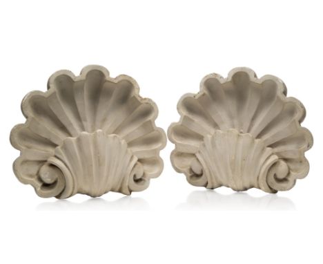 A pair of shell form plaster wall lights,Second half 20th Century,Incorporating stylised scallop shell motifs, each wired wit