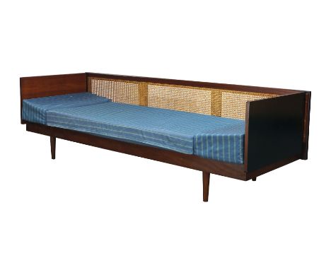 Dennis Young (British), a teak and caned sofa,c.1960,A scarce model, with caned back and fold down sides, with loose seat cus