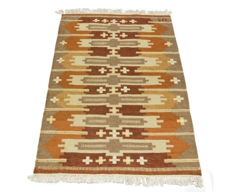 A Swedish flatweave wool kilim,c.1960/70, signed in the weave - 'MF',In light brown, yellow and orange tones, with horizontal