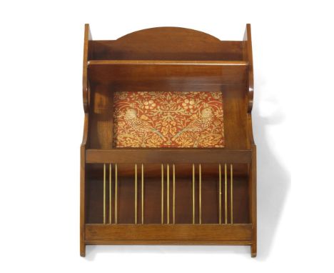 Shapland & Petter of Barnstaple (British), an Arts and Crafts wall mounted mahogany magazine rack lacking back panel, c.1905,