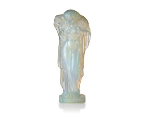 Sabino (French), an opalescent glass figure of a 'lady holding a lamb',c.1930, moulded Sabino Paris, engraved on the back of 