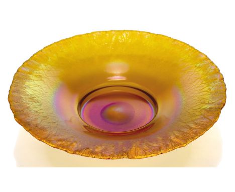 Attributed to WMF, a 'Myra' iridescent glass dish,c.1930, ground out pontil,Decorated with orange, pink and green iridescence