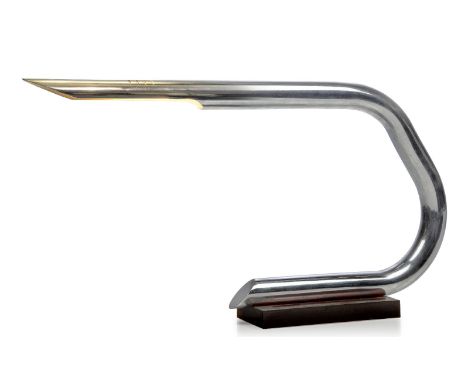 An Italian chromed desk lamp,c.1970, The tubular chromed and pierced light casing, on rectangular brown Perspex base,35cm hig