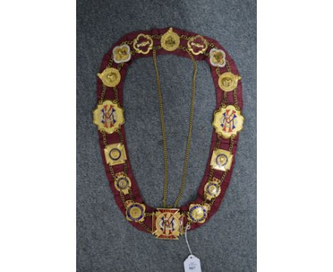A gilt metal chain of honour with enamel decoration.