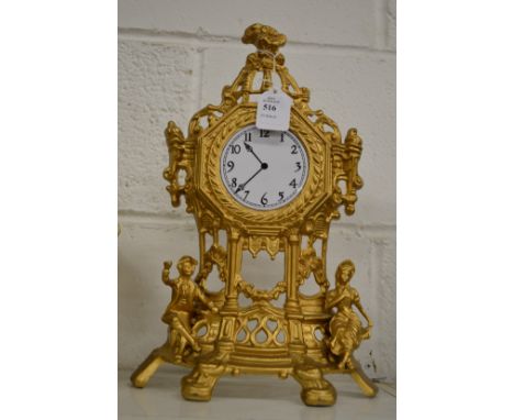 A gilt spelter mantle clock case (no movement).