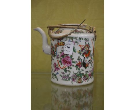 A Chinese Canton teapot.