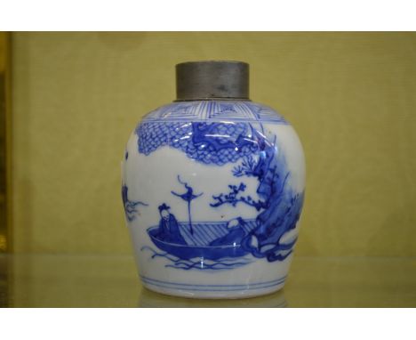 A Chinese blue and white porcelain tea caddy, with pewter cover.