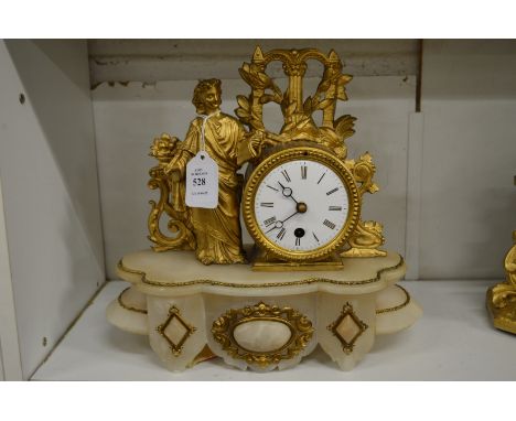 A French decorative gilt metal and alabaster mantle clock.