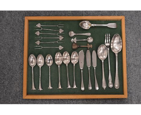 A small collection of silver flatware to include spoons etc.