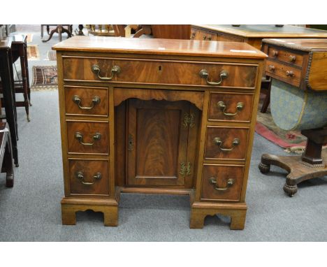 A good George III style mahogany small kneehole desk.