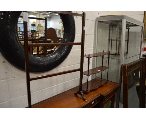 A mahogany towel rail and a wall shelf.