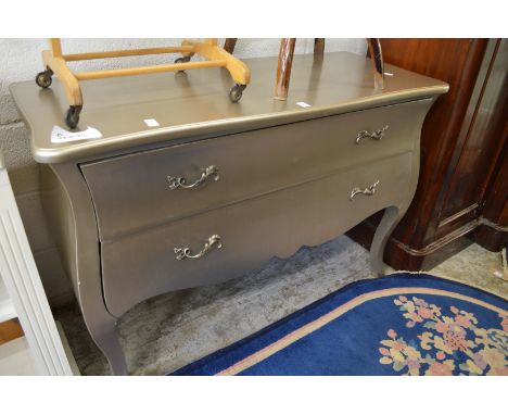 A silver painted two drawer commode.