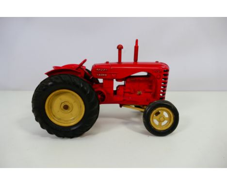 Lesney - An unboxed large scale Massey Harris 745D tractor. It measures approximately 20 cm long and appears in Good overall 