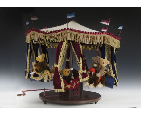 Steiff - Unused stock - A boxed Millennium Carousel set #038709. Carousel measures 58cm in diameter and 64cm tall. Contains a