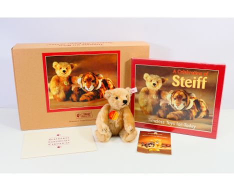 Steiff - Unused stock - A boxed Steiff Special Edition / Limited edition "Teddy Bear With Book ". Contains a shrink wrapped b