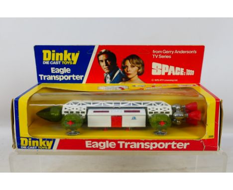Dinky - A boxed #359 'Space 1999' Eagle Transporter. Item appears to be in excellent-near mint condition. Housed in a good pl