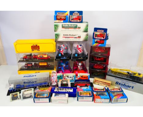 Corgi - Matchbox - Atlas - Oxford - A collection of boxed models including Scania Topline Curtainside, Dennis F106 Fire Engin
