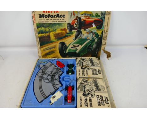 Airfix - A Motor Ace racing set M.R.7. Item include both cars controller and track. Item appears to be in good condition with