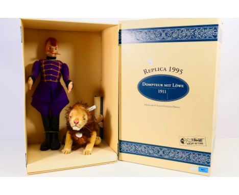 Steiff - A boxed Limited Edition (414 of 1200) Steiff Lion Tamer with Lion. A 1995 Replica of a 1911 Lion Tamer doll. The fel