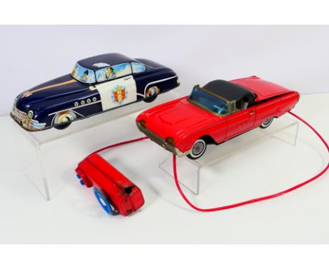 Tin plate - Two vintage tin plate vehicles to include: A (presumed) Welso Toys friction drive Highway Patrol car, made in Gt 
