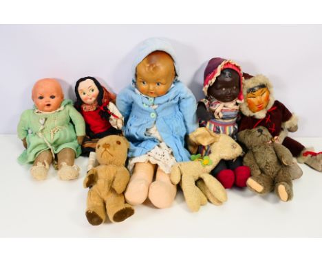 A collection of vintage dolls and bears to include: Bisque headed cloth limb dolls, largest measuring approx 50 cm with a pai