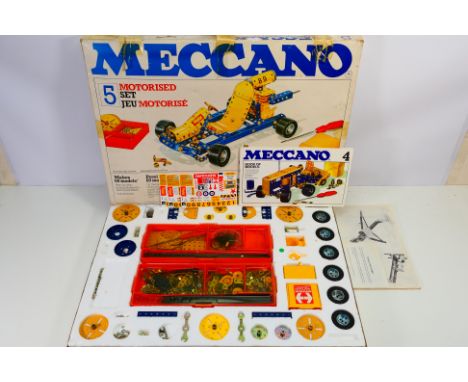 Meccano -  A boxed vintage Meccano set # 5. The set shows some signs of use and appears in Fair condition with instruction bo