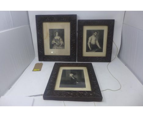 Three 19th century oak frames, carved with scrolling foliage, with portrait engravings, 37 x 32cm 
