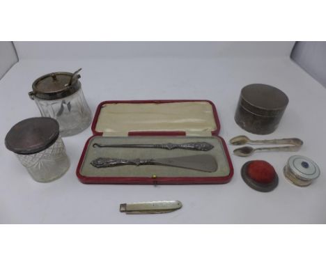 A collection of eight silver items to include an engine turned compact pot, a guilloche enamel top silver case, pin cushion, 
