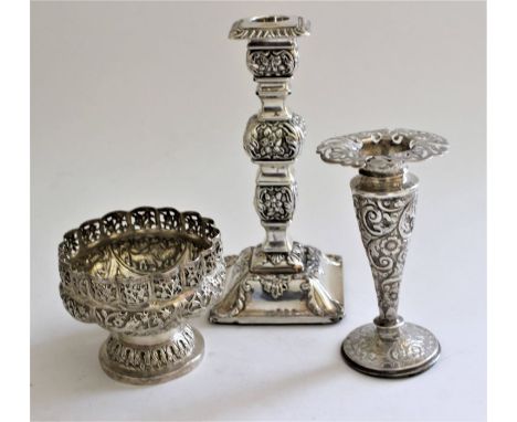 A Victorian silver candlestick partly repousse with foliate scrolls, on square base, Birmingham 1891, the detachable sconce u