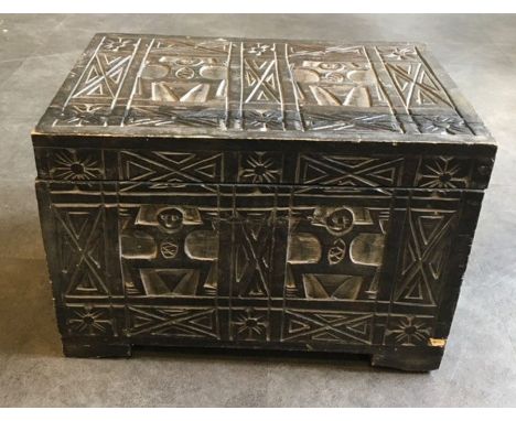 An African wooden trunk. H:29cm, L:43.5cm D:30.5cm