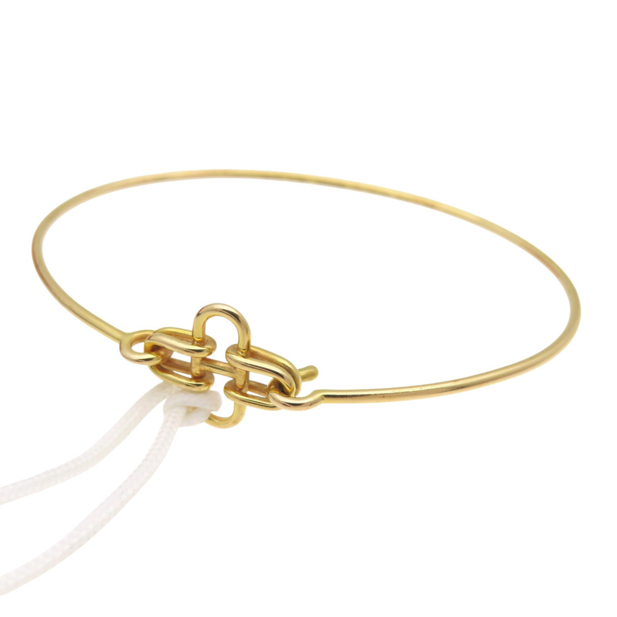 Excellent condition Hermes Rose de Mer 18K Yellow Gold Bangle, 1857, for women.