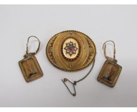 An attractive oval shaped gold Brooch, with central ruby type stone surrounded by pearls, together with a pair of "sea weed" 