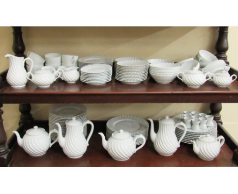 A large Haviland (Limoges) France white coloured ripple design Breakfast Service, including egg cups, milk jugs, teapot, coff