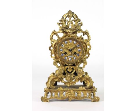 A fine quality 19th Century gilt ormolu cased Mantel Clock, by Roblin, Paris, with floral and scroll decoration in the rococo