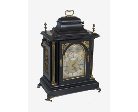 A very good large Victorian chiming Bracket Clock, the ebonised body decorated with brass and ormolu mounts, the brass dial w