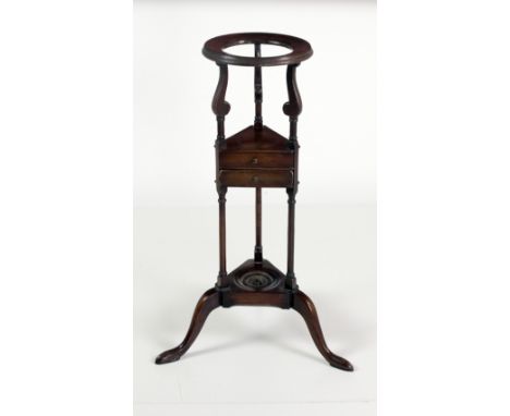 A 19th Century style mahogany Wig Stand, with circular open top over two drawers supported by a tripod base on cabriole legs.