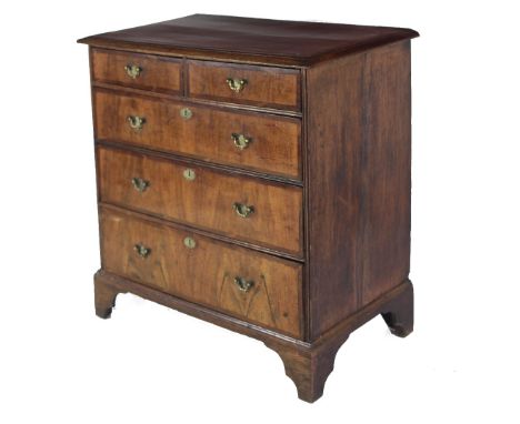 A 19th Century oak five drawer Chest, with two short and three long drawers, the inlaid top over similar design front, embell
