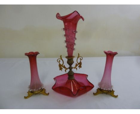 A Victorian ruby glass centre piece and two Victorian vases with gilt metal bases