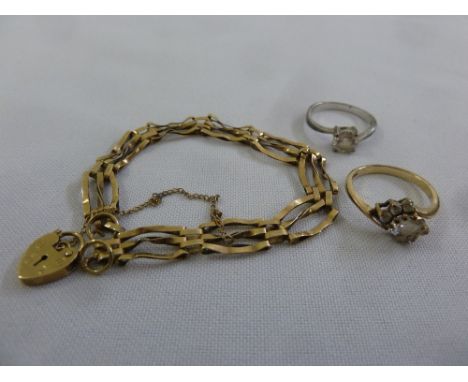 A 9ct gold ring, a silver ring and a 9ct gold gate link bracelet,  A/F